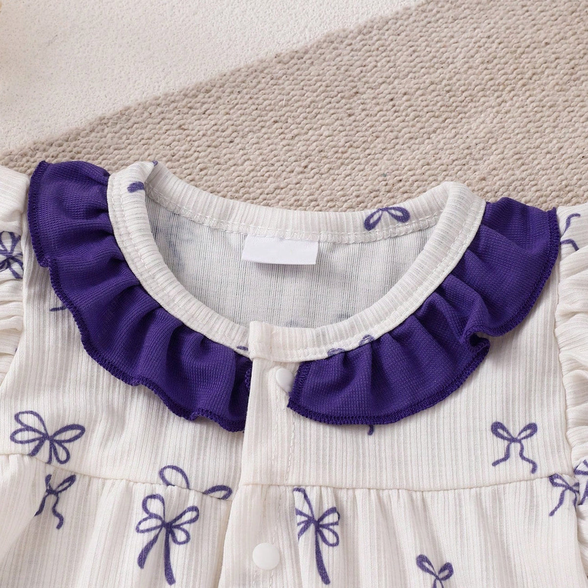 Sweet Allover Bow Print Flutter Sleeve Baby Girl Jumpsuit
